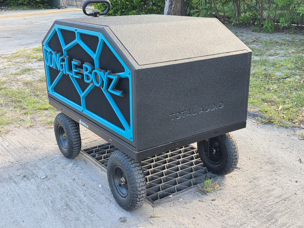 Stuntwalls Stuntbox GameDay MAX custom portable bluetooth sound system with CNC team graphics, rugged bedliner outdoor enclosure and all terrain wagon base.